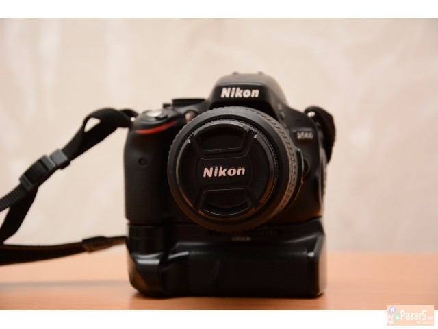 Nikon D5100 + Nikkor 18-55mm + Battery Grip + Grun