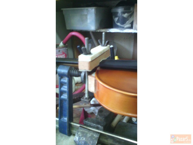 Popravka na gudacki instrumenti